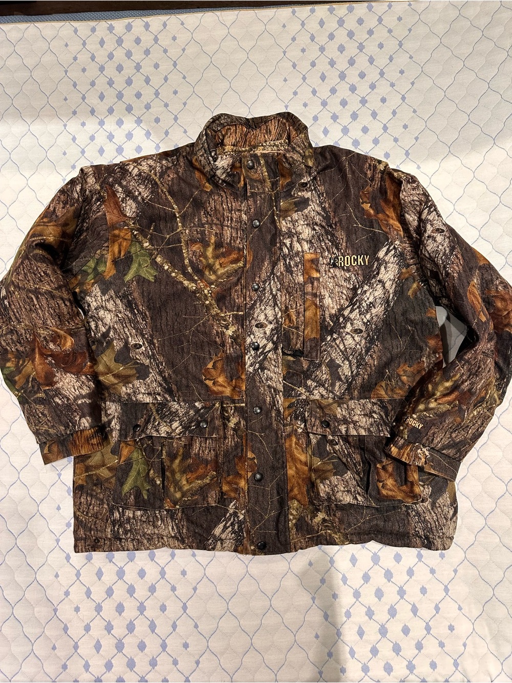 Rocky 2X reversible winter camo coat flaw: cuff rip